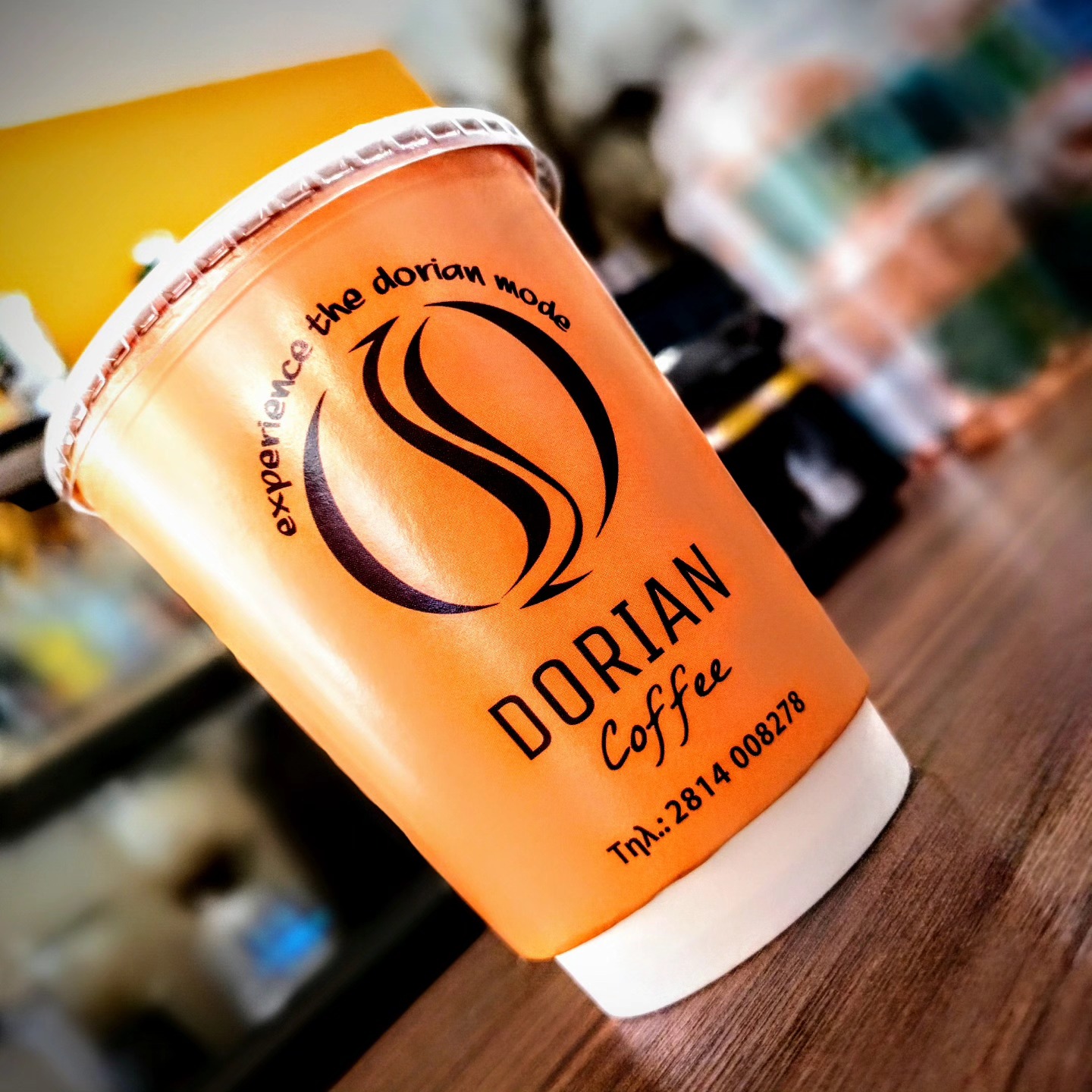 Branded Dorian Coffee takeaway cup